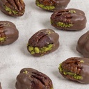 Chocolate Pecan Pistachio Bites in cylinder box