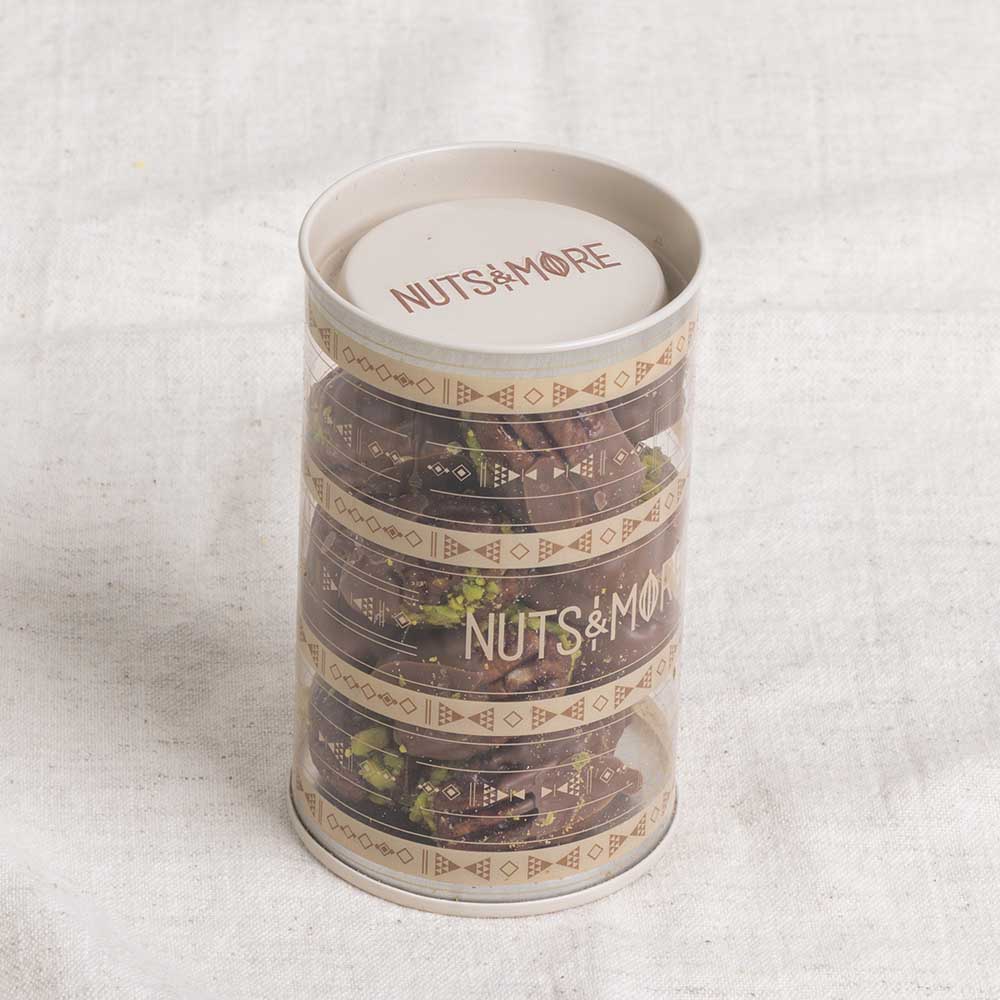 Chocolate Pecan Pistachio Bites in cylinder box