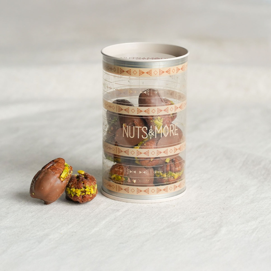 Chocolate Pecan Pistachio Bites in small cylinder box